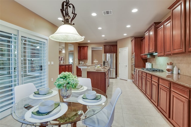 dining area with recessed lighting, visible vents, and light tile patterned flooring