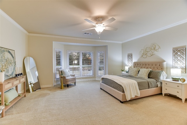 bedroom with ornamental molding, baseboards, visible vents, and light carpet