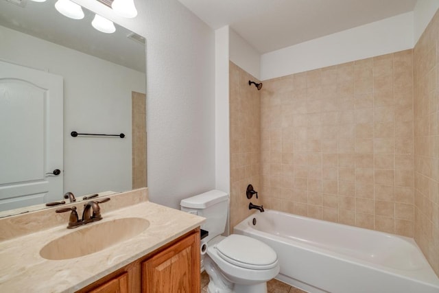 full bathroom with vanity, toilet, visible vents, and shower / washtub combination