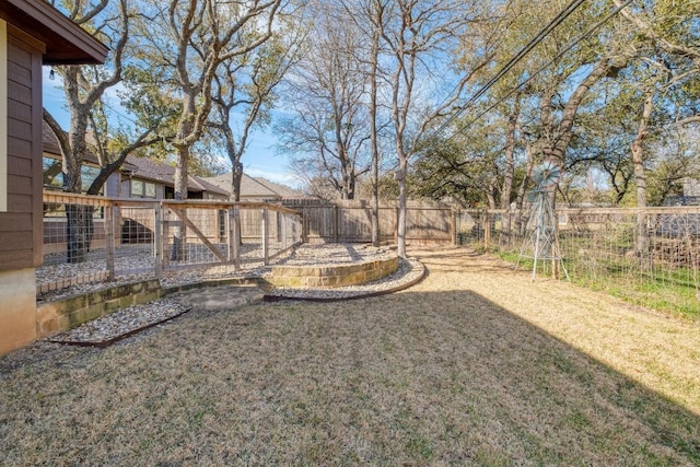 view of yard featuring a fenced backyard