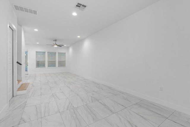 unfurnished room featuring visible vents, recessed lighting, stairs, and baseboards