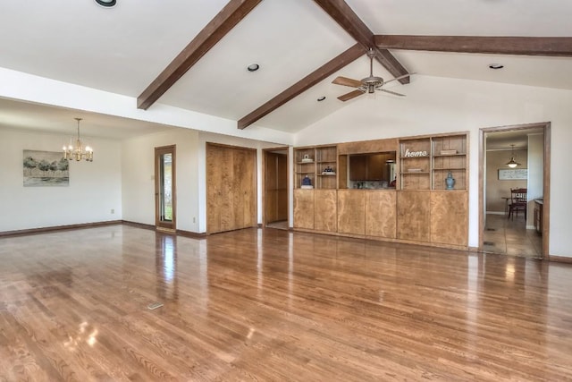 unfurnished living room with wood finished floors, baseboards, high vaulted ceiling, beamed ceiling, and ceiling fan with notable chandelier