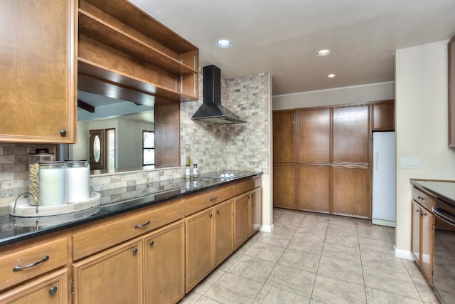 kitchen featuring wall chimney range hood, decorative backsplash, light tile patterned flooring, black appliances, and open shelves