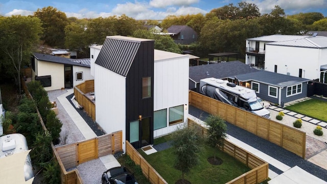 birds eye view of property with a residential view