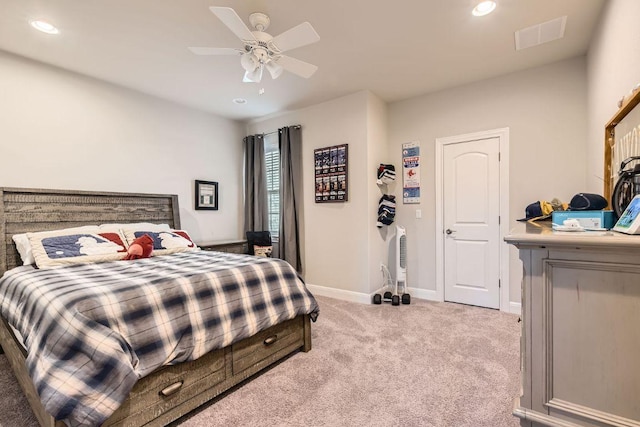 bedroom featuring recessed lighting, baseboards, and light colored carpet