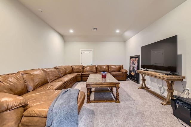 living room featuring recessed lighting, light colored carpet, and visible vents