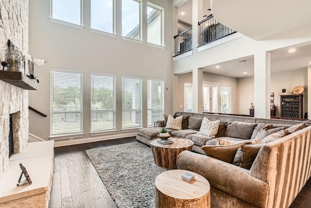 921 Morning Moon Cir, Austin, TX 78732 - living room featuring wood finished floors and a towering ceiling