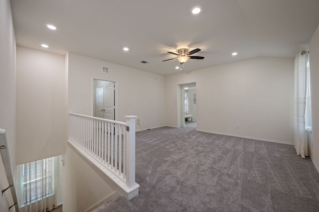 carpeted empty room with visible vents, recessed lighting, baseboards, and ceiling fan