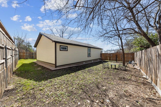 view of yard with a fenced backyard