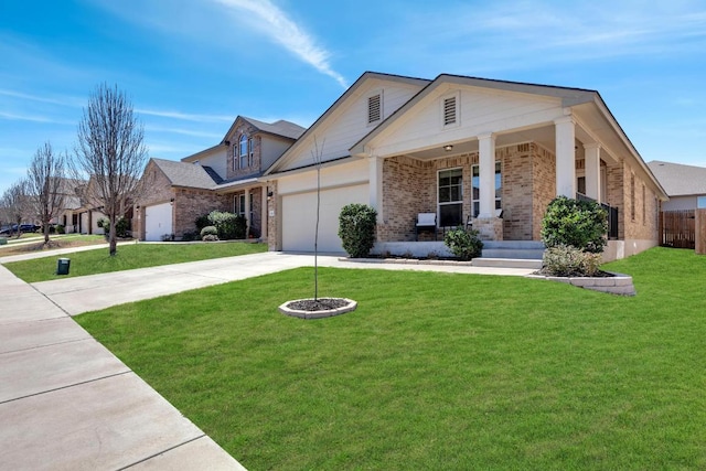 view of front facade with a front lawn, brick siding, a garage, and driveway