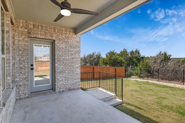 view of patio / terrace with fence private yard and ceiling fan