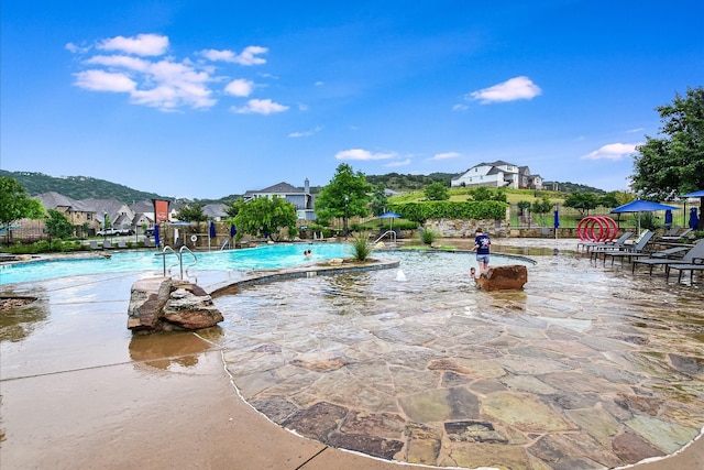 pool featuring a patio