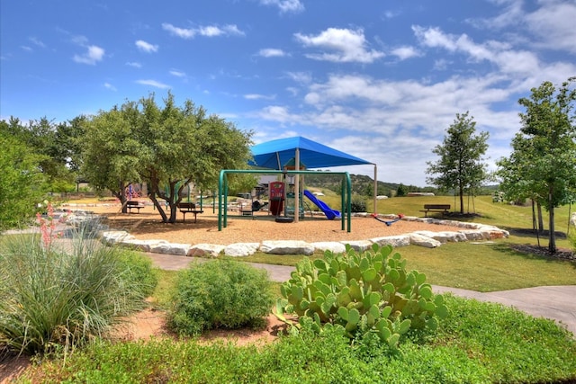5300 Traviston Dr, Austin, TX 78738 - communal playground featuring a lawn