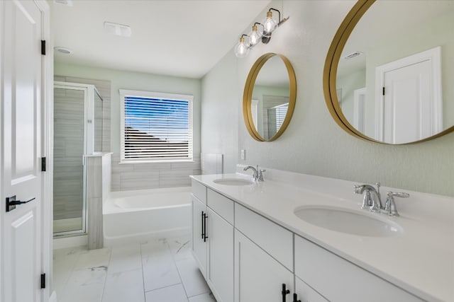 5300 Traviston Dr, Austin, TX 78738 - bathroom featuring double vanity, a shower stall, a bath, and marble look tiles