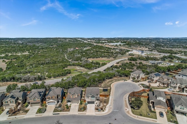 birds eye view of property with a residential view