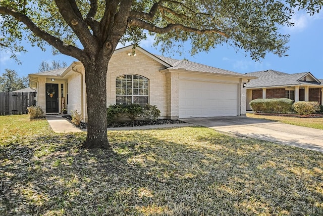 ranch-style house with a front yard, fence, an attached garage, concrete driveway, and brick siding