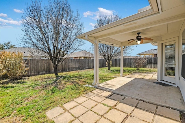 view of patio / terrace featuring a fenced backyard and a ceiling fan