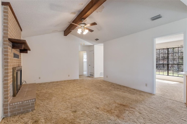 unfurnished living room featuring lofted ceiling with beams, visible vents, carpet, and a ceiling fan