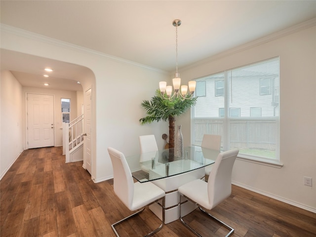 dining area with a notable chandelier, baseboards, and dark wood-style flooring