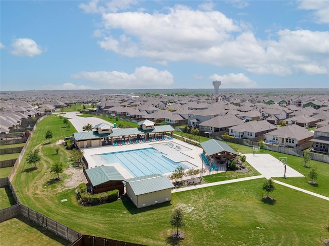 birds eye view of property with a residential view