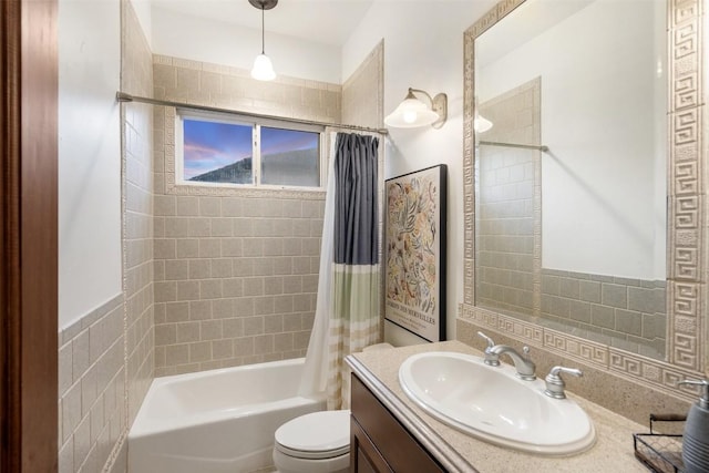 bathroom with shower / bath combo with shower curtain, toilet, and vanity