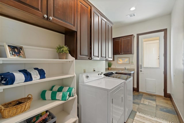 12027 Pleasant Panorama Vw, Austin, TX 78738 - laundry area with cabinet space and separate washer and dryer
