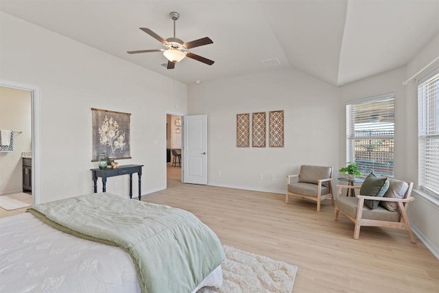 bedroom with light wood-type flooring, baseboards, a ceiling fan, and vaulted ceiling