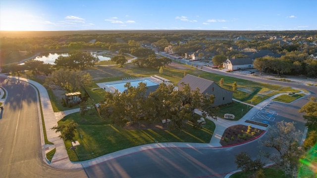 drone / aerial view featuring a water view