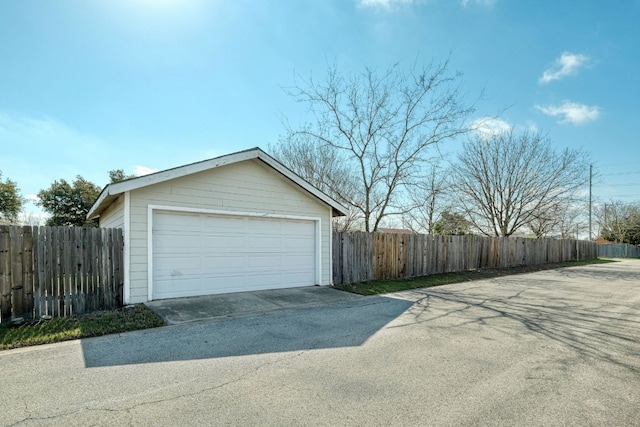 detached garage with fence