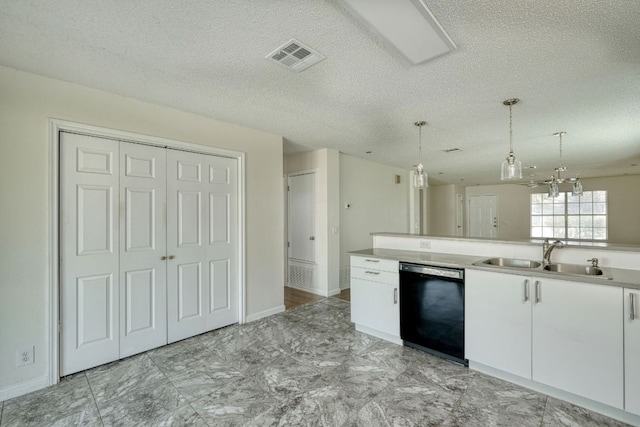 kitchen with a sink, visible vents, dishwasher, and white cabinetry