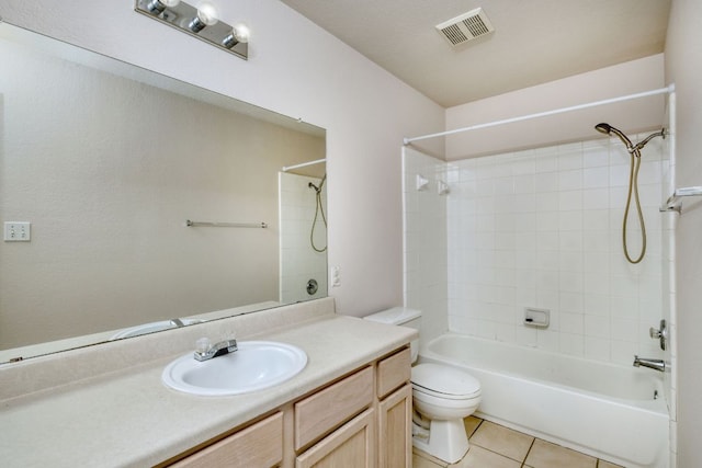 bathroom featuring vanity, visible vents, tile patterned flooring, bathing tub / shower combination, and toilet