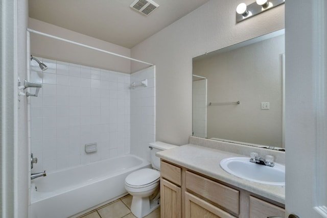 bathroom with visible vents, toilet, shower / bathing tub combination, tile patterned floors, and vanity