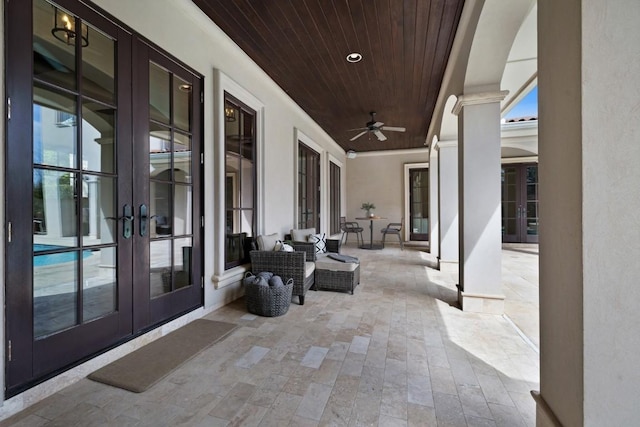 view of patio / terrace with french doors and ceiling fan