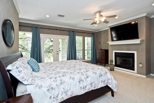 carpeted bedroom featuring access to exterior, crown molding, french doors, and visible vents