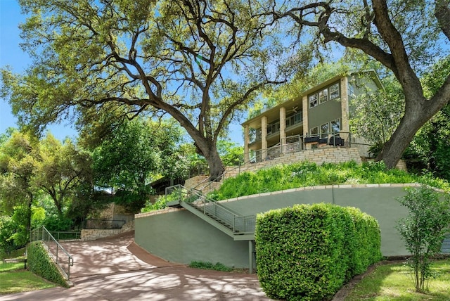 surrounding community featuring stairway