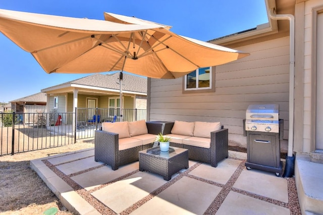 view of patio / terrace with an outdoor living space and fence