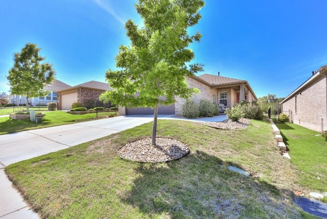 705 Kitty Hawk Rd, Georgetown, TX 78633 - view of property hidden behind natural elements with an attached garage, a front lawn, stone siding, and concrete driveway