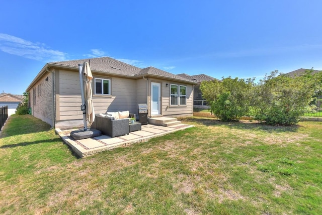 705 Kitty Hawk Rd, Georgetown, TX 78633 - back of house with a yard, an outdoor hangout area, a patio, and fence