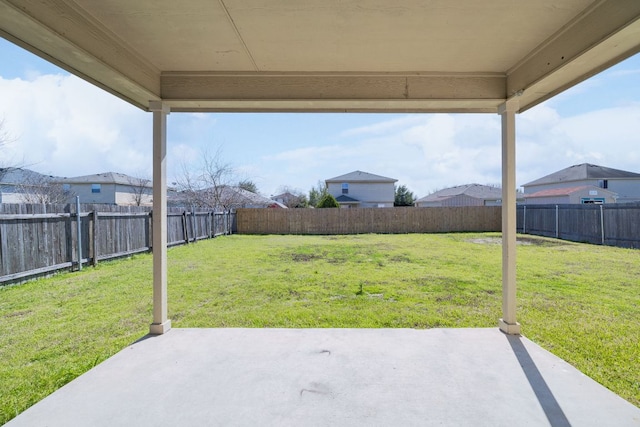 view of yard featuring a patio area and a fenced backyard