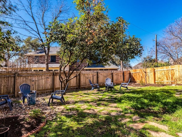 view of yard featuring a fenced backyard