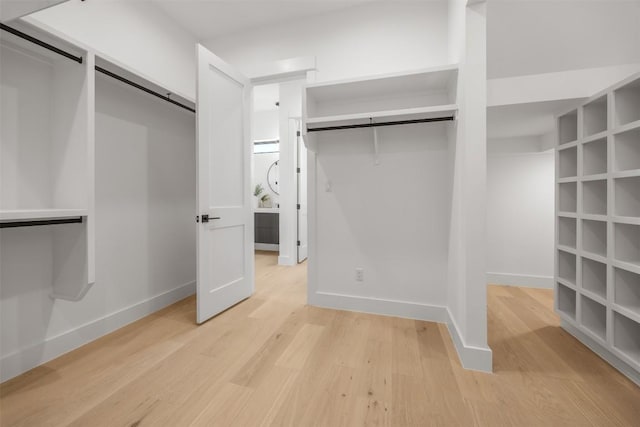 8112 Kuhn Dr, Austin, TX 78736 - unfurnished bedroom with light wood finished floors and baseboards