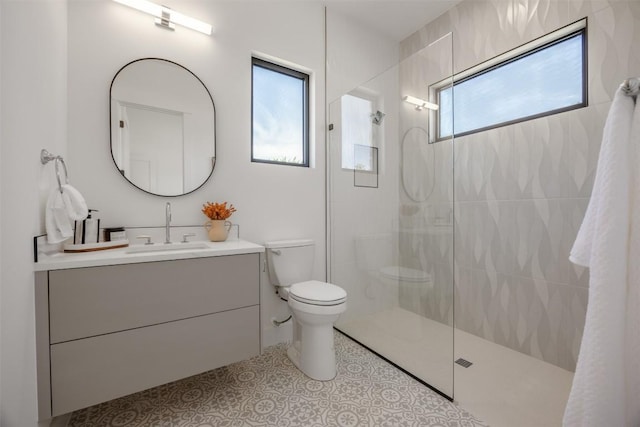 8112 Kuhn Dr, Austin, TX 78736 - bathroom with toilet, vanity, and a walk in shower