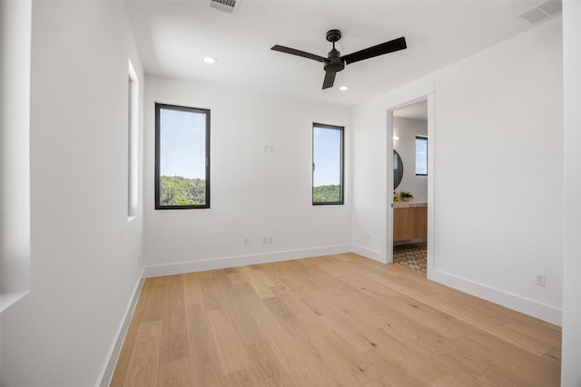 8112 Kuhn Dr, Austin, TX 78736 - empty room featuring light wood-type flooring, a ceiling fan, and recessed lighting