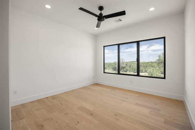 8112 Kuhn Dr, Austin, TX 78736 - spare room with ceiling fan, light wood-type flooring, baseboards, and recessed lighting