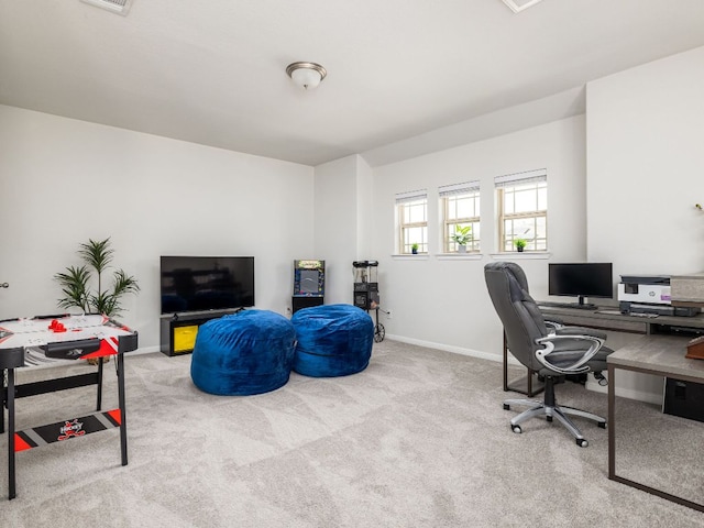 office with carpet flooring and baseboards