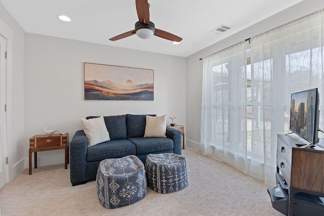 living room with recessed lighting, light colored carpet, visible vents, and ceiling fan