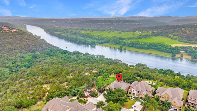 birds eye view of property featuring a water view and a residential view