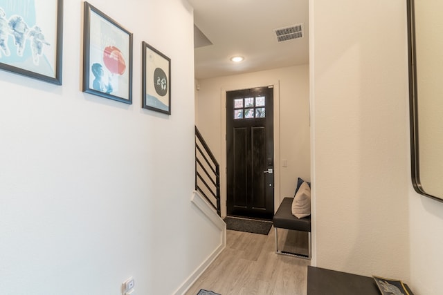 foyer with visible vents, recessed lighting, and light wood-style floors