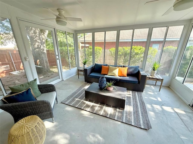 sunroom with ceiling fan and outdoor lounge area