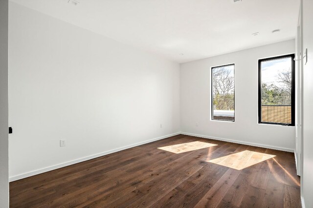 2603 Little John Ln, Austin, TX 78704 - empty room featuring dark wood-style floors